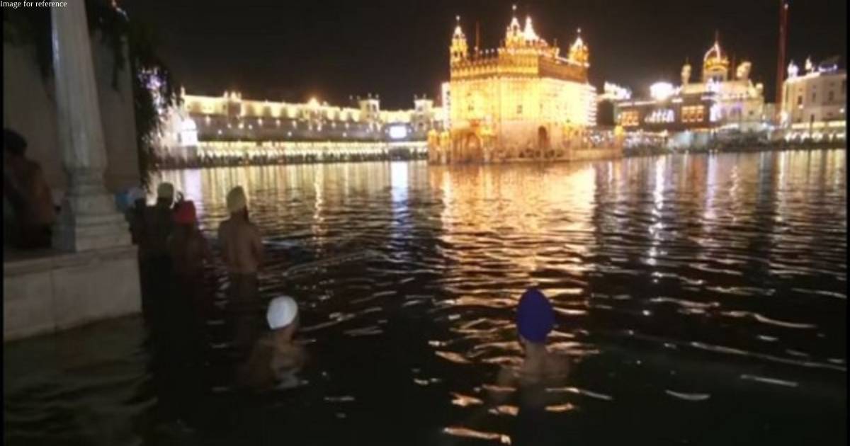 Devotees take dip in Holy Sarovar of Golden Temple on Diwali